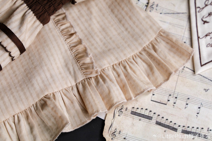 Poetry of Music Ribbon Tie Blouse