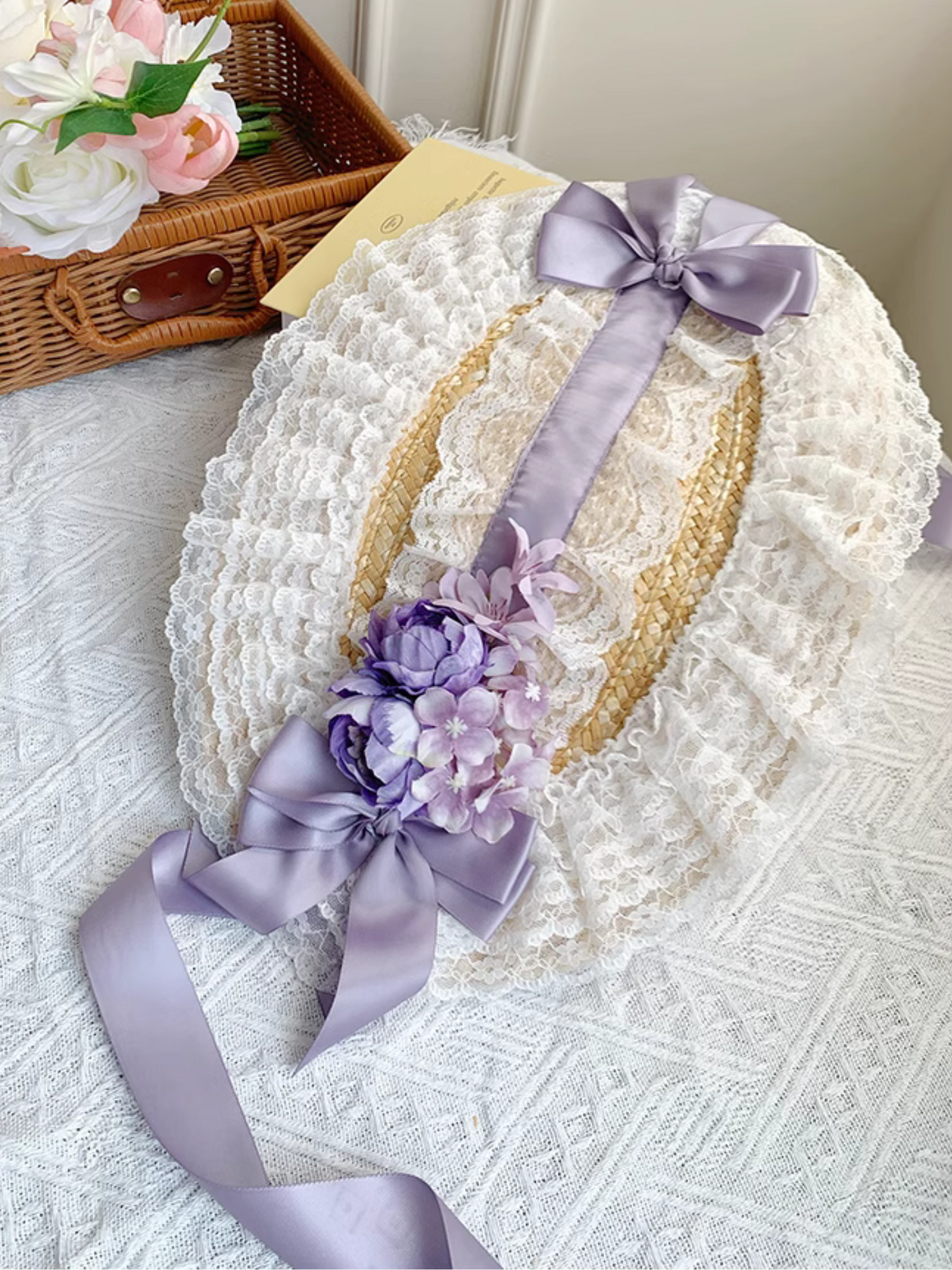 Straw hat bonnet with roses and ribbons