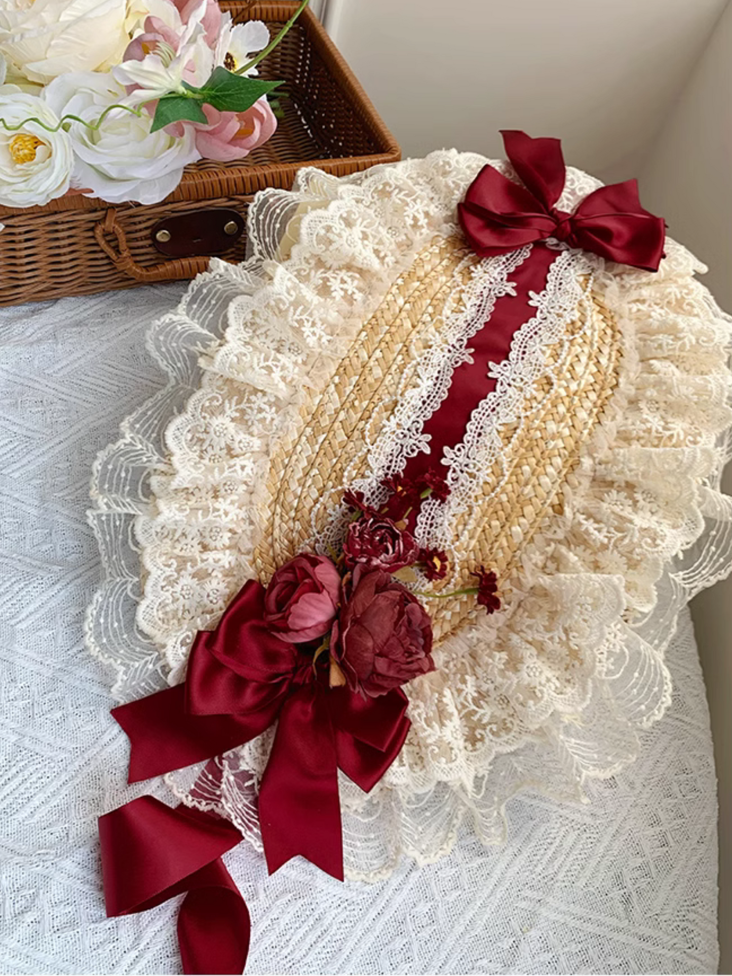 Straw hat bonnet with roses and ribbons