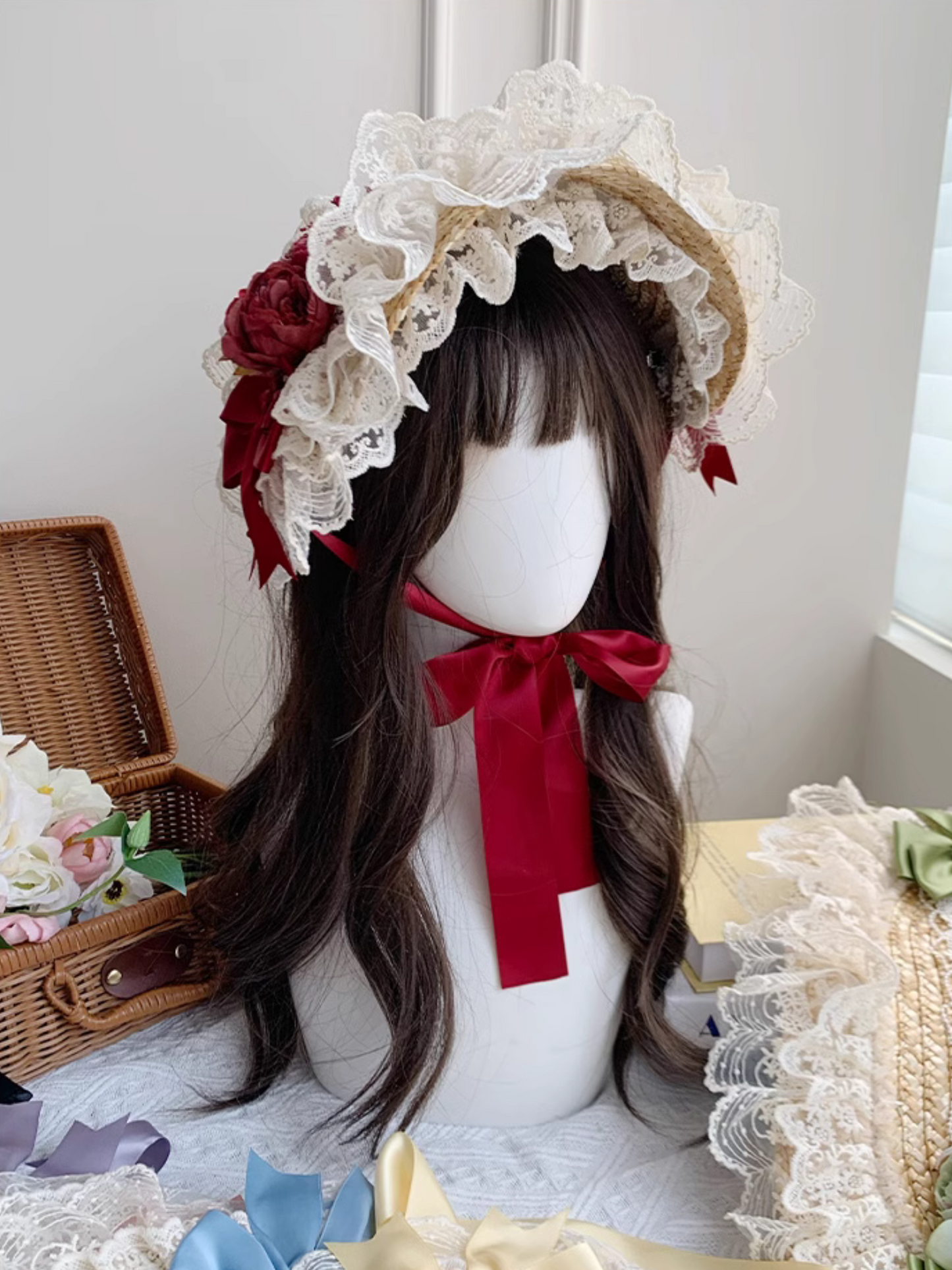 Straw hat bonnet with roses and ribbons