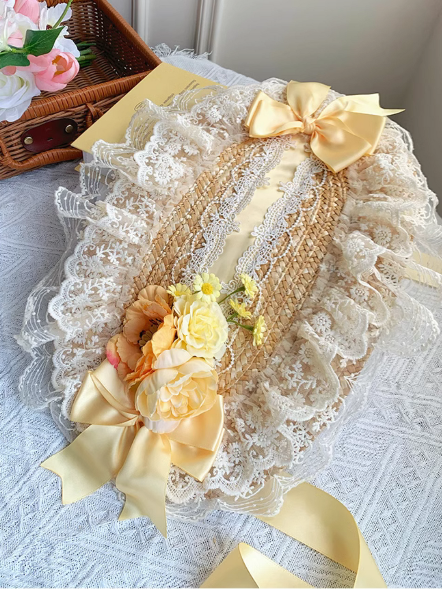 Straw hat bonnet with roses and ribbons