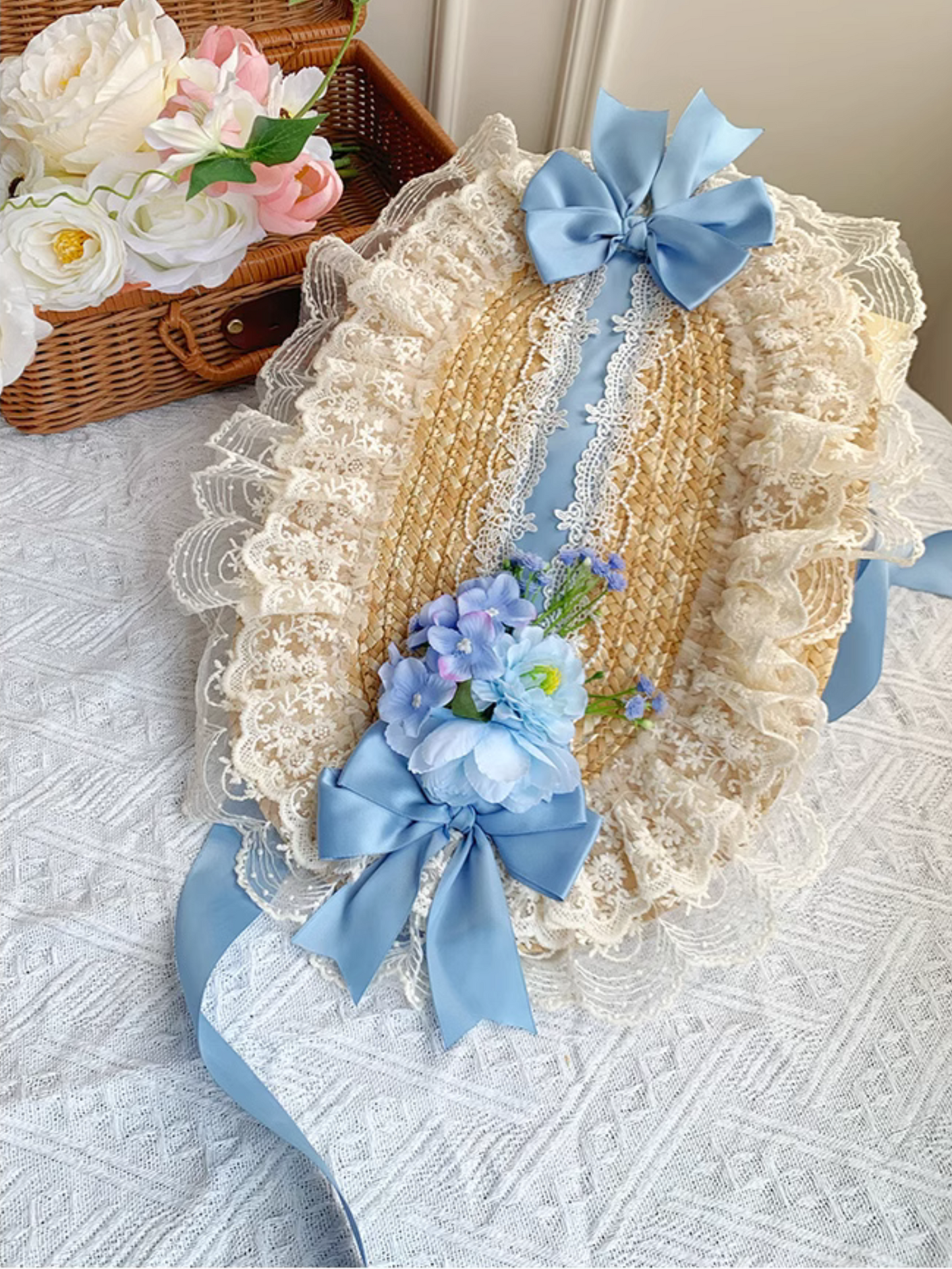 Straw hat bonnet with roses and ribbons