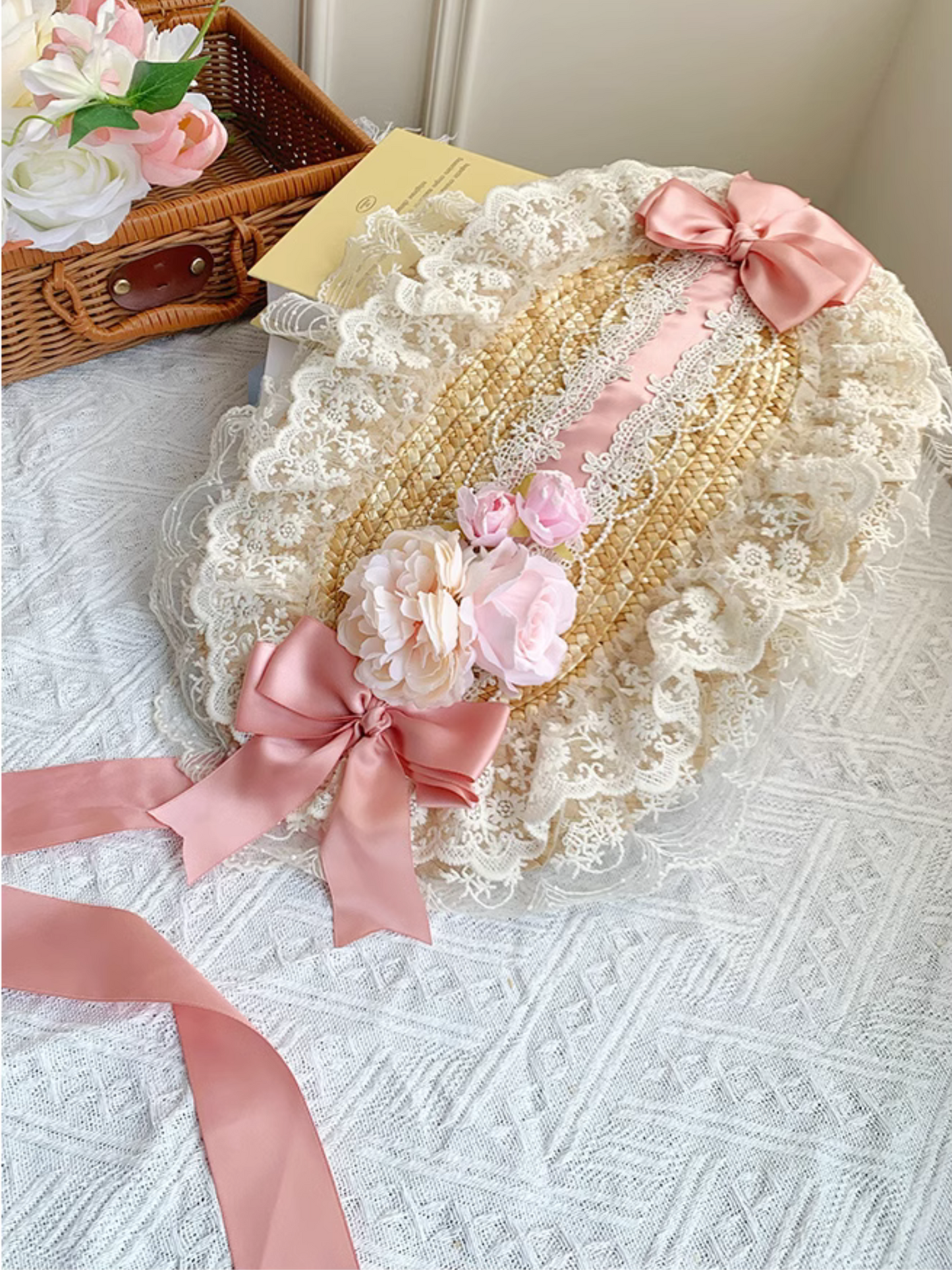 Straw hat bonnet with roses and ribbons