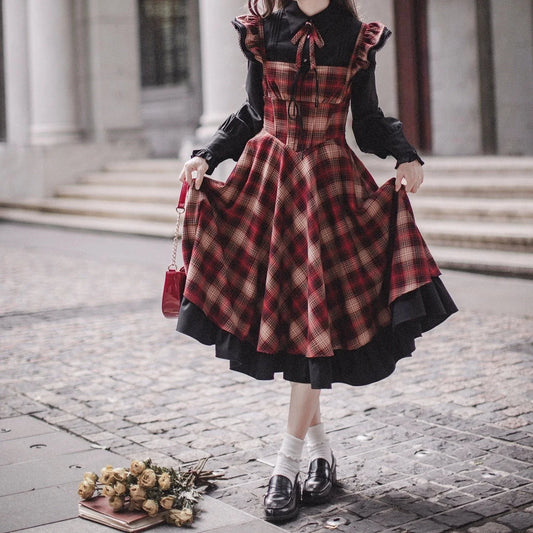 Red checked bicolor jumper skirt and black blouse