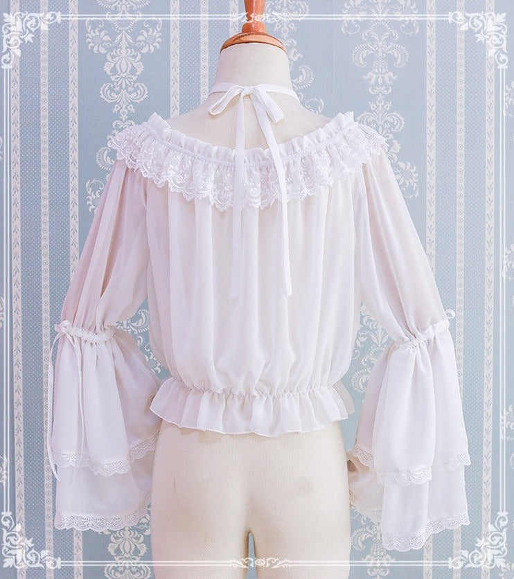 シフォンのデザインショルダーブラウス