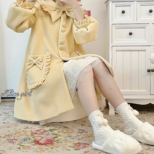 パステルカラーのリボンコート