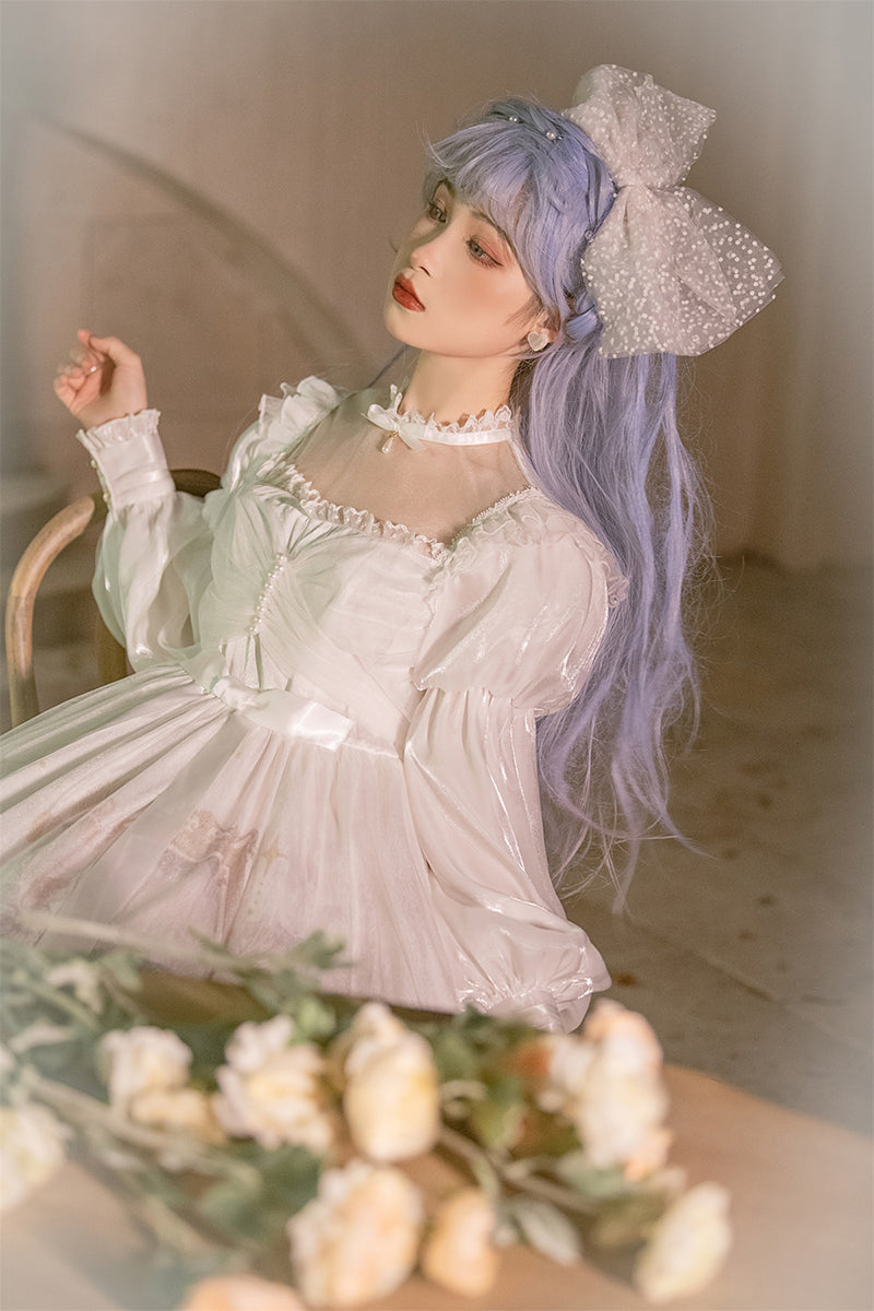柔らかシフォン素材のエンジェルプリント ドレス