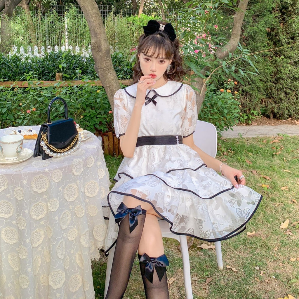 蝶の透かし模様ティアードワンピース