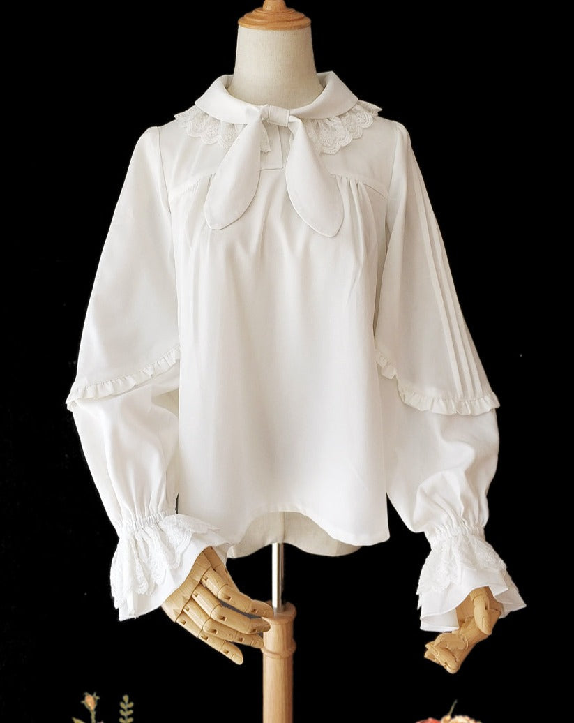 Blouse with bunny ear ribbon tie