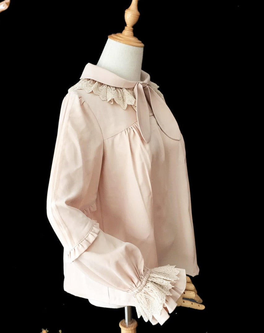 Blouse with bunny ear ribbon tie